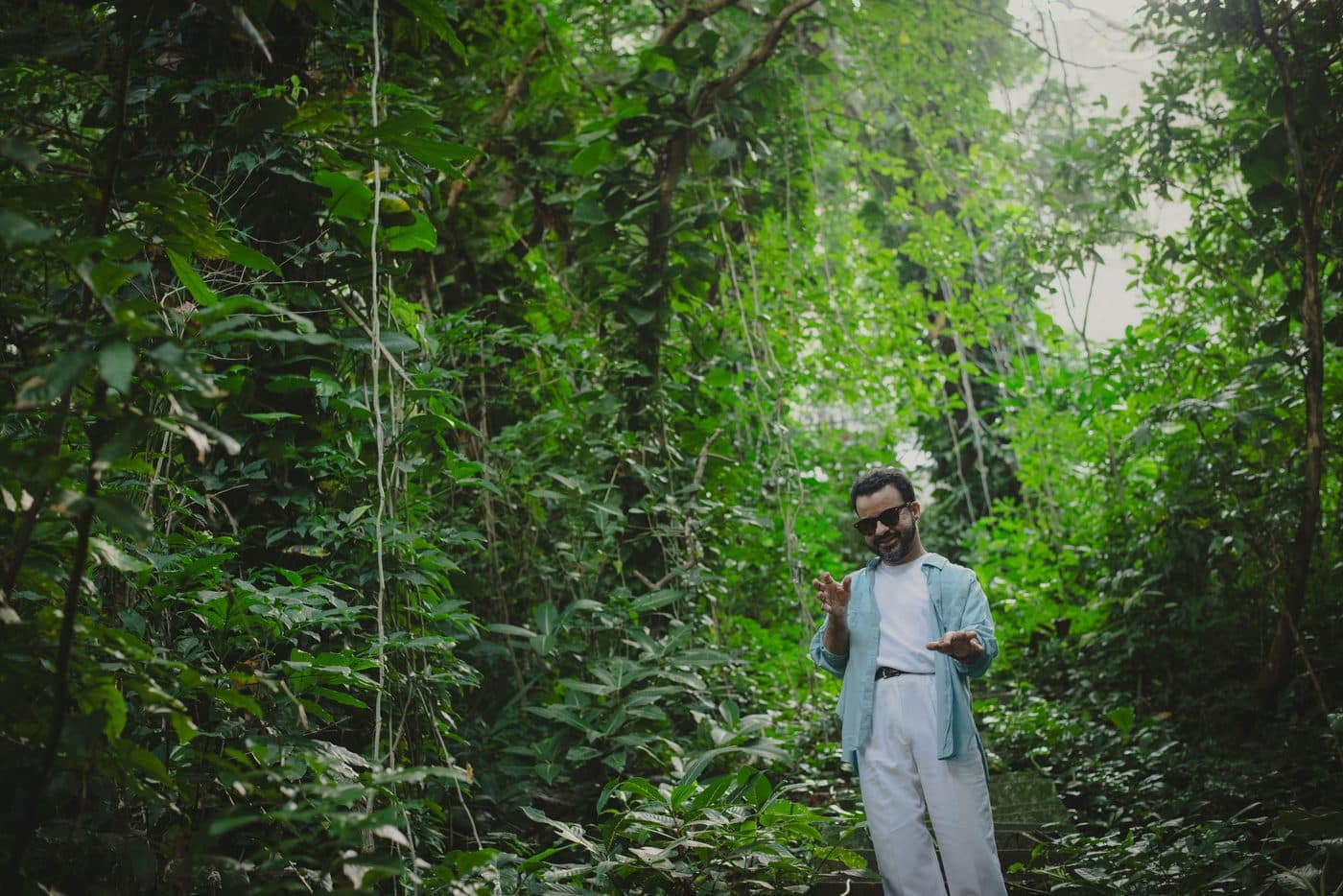 Marcelo Galter on a stone stairway in the forest